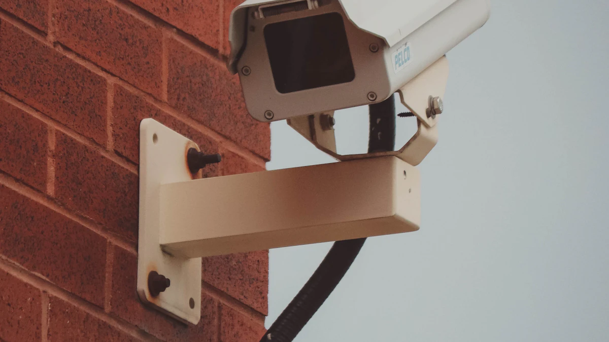 PoE-style security camera mounted on a commercial brick wall