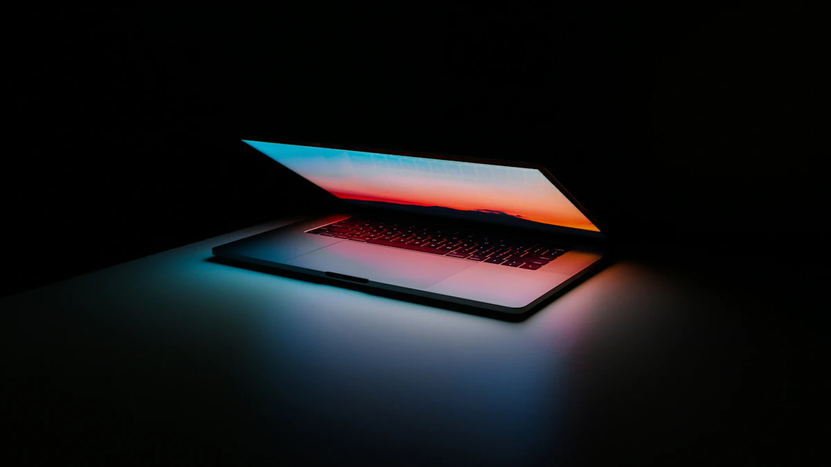 Open laptop on a wooden desk in a professional workspace